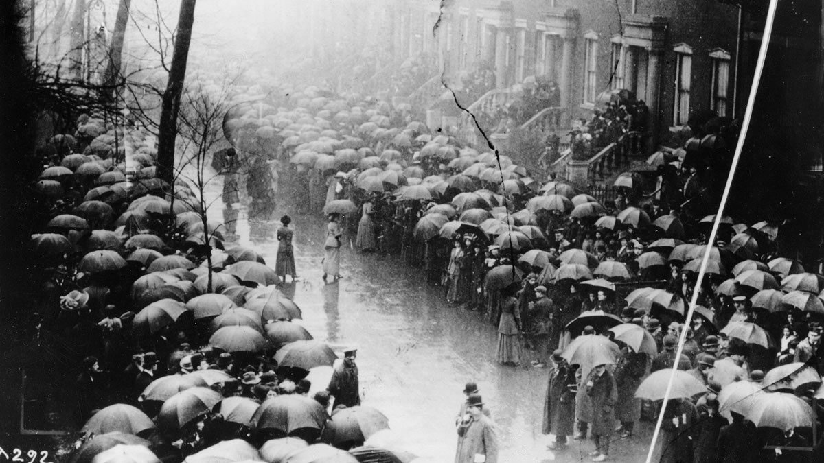 Mourners line the streets during a funeral procession for victims of the Triangle fire, April 5, 1911